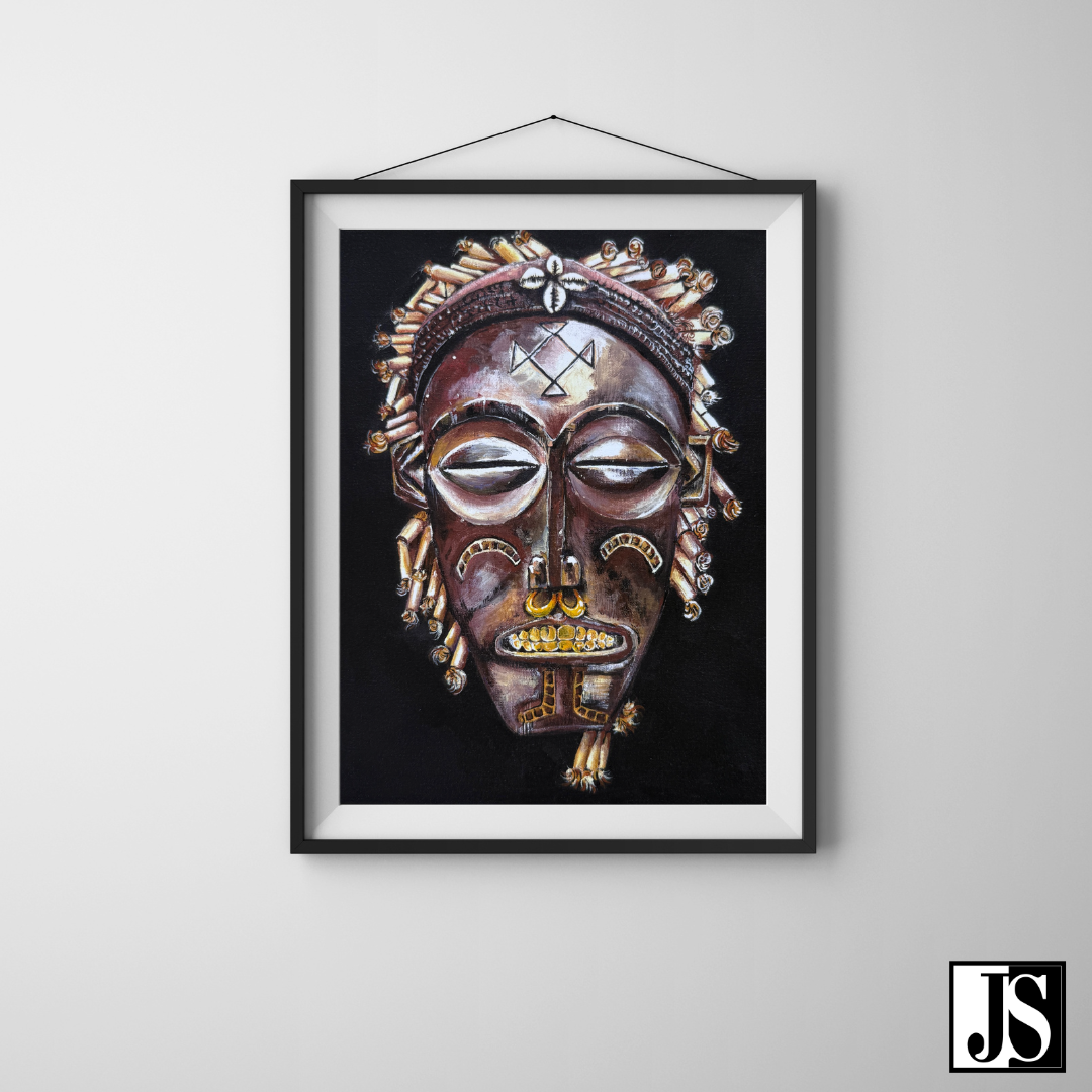 Framed artwork of an African mask on a gray wall